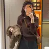Nuevo suéter de cuello alto de punto para mujer estilo coreano, otoño e invierno, nicho, casual y holgado, con un estilo elegante y relajado, presenta un top de punto con puños
