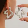 Pendientes de flor de cinco pétalos de doble capa de personalidad ins transfronterizos europeos y americanos pendientes de borla de hojas rayadas retro fabricantes