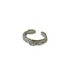 Anillo Suchuang S925 Plata de Ley Textura Piedra Lunar para Mujer Ins Sentido Avanzado Piedra Fluorescente Lava Anillo Estilo Frío