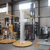 Máquina bobinadora de techo Shandong Dahong TP1650F-DCS máquina envolvedora de película para panel de puerta puerta y ventana
