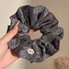Estilo perezoso 2026 nuevo coletero de oso con pompón y diseño floral, accesorio para el cabello retro y de alta gama para mujeres