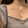 Elegante collar con colgante de mariposa tridimensional hueca japonesa y coreana, dulce y a la moda, con borla larga y cadena de clavícula.