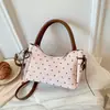 Bolso de verano con forma de dumpling, bolso de hombro versátil de nuevo estilo, bolso cruzado de moda para el trabajo 2026, bolso de un solo hombro para mujer