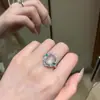Nuevo Anillo de Calcedonia Transparente Estilo Chino con Jade Blanco y Diamantes Completos para Mujer con Anillo Abierto Artístico Elegante Superficie de Huevo de Alta Gama