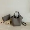 Bolso tote europeo y americano de alta calidad, bolso de axila vintage de primavera Maillard, bolso de hombro simple de gran capacidad para el día a día