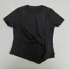 Camiseta de Manga Corta con Cuello Redondo Simple y Dobladillo Irregular para Mujer Verano Nuevo Casual Nicho Color Sólido Versátil Top Adelgazante