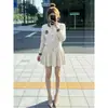 Conjunto de dos piezas de cárdigan de punto casual y suave y falda estilo coreano para mujer, atuendo súper popular