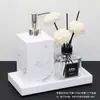 Kit de artículos de tocador de baño europeo para hotel Baño de habitación modelo Adornos de baño Botella de desinfectante de manos Botella de loción Juego de bandeja