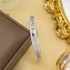 Pulseira para Mulheres Aço Titânio Europeia e Americana Não Desbota Cobre Inlaid Zircônio Pulseira Nicho High-End Moda Joias Atacado Joias de Mão