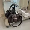 Bolsa de axila de nicho de luxo leve de alta qualidade para mulheres 2026 novo outono super quente requintada bolsa tote de ombro único para o dia a dia