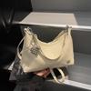 Bolso pequeño casual de axila con textura de guijarros para mujer 2025 Nuevo moderno Moda de primavera Bolso casual de mano Bandolera de un solo hombro