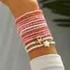 Pulseras de Cuentas Estilo Bohemio Oceánico Europeo y Americano Transfronterizas, Versátiles, Modernas y Dulces Pulseras de Cuentas de Arroz Turquesa, Catorce Piezas