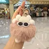 Novo animal de estimação fofo pequeno cerdas monstro boneca pingente anti-perdido chaveiro mochila pingente pelúcia super fofo presente
