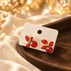 Aretes Geométricos Rojos Ankela Festivos de Año Nuevo Nicho Temperamento Venta Caliente Aretes de Botón Otoño/Invierno 2026 Venta al por Mayor de Pendientes