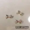 Arte de Uñas Transfronterizo Ultra Brillante Circonita Lazo Plateado Decoración de Uñas Celebridad de Internet Popular Venta Caliente Mariposa Pequeña Accesorios para Uñas Al por Mayor