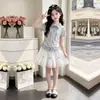 Moderna Camisa Polo Delgada de Manga Corta 2026 para Niñas, Dulce Conjunto de Falda de Dos Piezas con Encaje para Verano