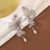 Brincos Borboleta Vazados de Zircônia Roxa 2025 Novo Design de Nicho de Luxo Leve Clipe de Orelha Moda Brincos Elegantes