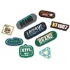 Letrero de silicona personalizado bajo demanda ropa zapatos y sombreros bolsos gota de plástico caucho blando marca registrada insignia de caucho PVC logo en relieve