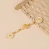 Botón Qipao nuevo estilo nacional chino botón de rana hilo tejido a mano envuelto en hilo bobina de cuenta dorada incienso doble botón cola larga botón de tela de una sola letra accesorios