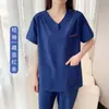 Roupas cirúrgicas femininas de alta qualidade confortáveis roupas de escovação manual com vários bolsos Roupas de trabalho médico masculinas estomatológicas hospitalares roupas de lavagem de mãos de secagem rápida