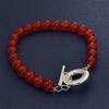 Joyería de comercio exterior plateada 8MM imitación ágata roja pulsera tiembla pequeño libro rojo en línea pulsera roja en stock al por mayor