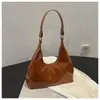Elegante bolso pequeño casual de PU brillante para mujer, bolso de hombro versátil, bolso estilo francés con textura vintage, bolso de axila para mujer, adecuado para ventas transfronterizas