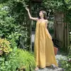 Vestido de tirantes amarillo atmosférico sin espalda estilo francés para mujer, vestido largo de encaje estilo resort de verano