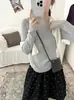 Outono de 2026 Novo Estilo Coreano Cor Sólida Gola Redonda Manga Longa Caimento Solto Versátil Casual Malha Top para Mulheres