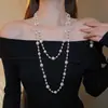 Collar Largo de Perlas Redondas de Personalidad Cruzada Estilo Retro Francés Hecho a Mano con Cuentas Cadena Larga para Suéter Europea y Americana Venta al por Mayor