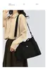 Bolsa transversal de grande capacidade com múltiplos compartimentos, novo estilo de moda feminina 2026, adequada para passeios, compras e como bolsa de mamãe ou bolsa de ombro