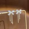 Requintado longo Tassel Bow Brincos Feminino High-end Temperamento Full Diamond Frente e Trás Brincos Nicho High-end Brincos