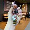 Tiktok Ouro Preto Astronauta Criativo Areia Movediça com Óleo Chaveiro Flutuante Fresco Astronauta Planeta Pingente Casal