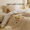 Juego de ropa de cama de algodón grueso estilo caricatura con bordado de toalla y funda de edredón jacquard, juego de tres piezas para cama individual de algodón puro