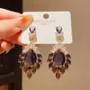 Pendientes Colgantes Flor Ovalada de Circonita Estilo Palacio Retro Nicho de Lujo Accesible Plata Aguja Elegantes de Gama Alta para Mujer
