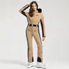 Nuevo traje de esquí de una pieza profesional para mujer para esquí al aire libre con doble tabla, a prueba de viento, cálido, impermeable, ajustado, alta elasticidad, traje de esquí transfronterizo para mujer