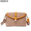 Bolso cruzado de lona impermeable para mujer, bolso de hombro de color liso con cuero de primera capa, suministro de fabricantes de desbordamiento