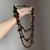Collar multicapa de estilo étnico vintage con cuentas y concha de coco para mujer, diseño único con un temperamento de alta gama, accesorio de cadena para la clavícula versátil