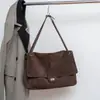 Bolso de piel de vaca de capa superior color gris elefante, bolso cruzado con un diseño único, nuevo bolso de nicho para debajo del brazo, bolso de mano y bolso de hombro de alta gama