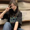 Camiseta de Manga Corta de Algodón Puro para Mujer Verano 2026 Nuevo Estilo Holgada Casual Retro Americano Estampado de Dibujos Animados Camiseta para Estudiante de Secundaria para Mujer