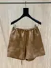 Frescura de verano~Pantalones cortos de lino marrón para mujer, estilo verano 2026, cintura alta elástica con cordón, longitud media, pierna ancha, modernos