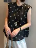 Camisa sin mangas de lunares retro estilo francés para mujer, diseño de verano 2026 con amarre único en la espalda, top blusa chic