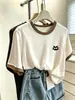 Hombro normal Algodón de copo de nieve Cuello redondo Bloque de color Manga corta Camiseta Diseño para mujer Sentido de la moda Nicho Moderno Elegante Top Capa base Verano