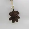 Muñeca de Peluche Enrollable Linda de Dibujos Animados Oso con Pajarita Llavero Colgante para Bolso Decoración para Ropa Zapatos Muñeca de Rociado