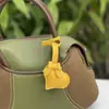 Lazo de Amor Creativo Color Sólido Colgante de Cuero Moda para Bolsos de Dama Accesorios de Joyería Colgante para Coche Decoraciones