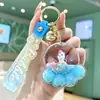 Chaveiro Fofo Transparente de Pata de Urso com Óleo Pingente de Unicórnio com Lantejoulas e Areia Movediça Acessório para Mochila de Estudante Presente Venda por Atacado