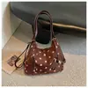 Bolsa de mano artística estilo coreano con lunares, estilo universitario para mujer, nueva moda 2026, bolso de hombro simple de gran capacidad