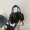 Bolsa de ombro estilosa estilo coreano para mulheres, nova moda primavera 2026, bolsa de ombro casual para trabalho e deslocamento, bolsa baguette para mulheres