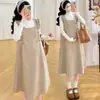 Vestido de Maternidad 2026 Otoño Invierno Estilo Francés Elegante Conjunto Holgado Cintura Ajustable Tejido de Punto + Falda de Lana de Maternidad
