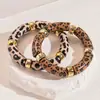 Pulseira Redonda Geométrica com Estampa de Leopardo Iridescente em Acrílico Europeia e Americana, Estilo Vintage de Nicho de Luxo, Acessório de Mão Único e Elegante