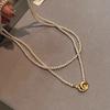 Atmósfera de moda francesa sentido doble capa hebilla de anillo collar de perlas diseño simple sentido temperamento cadena para la clavícula alta calidad joyería